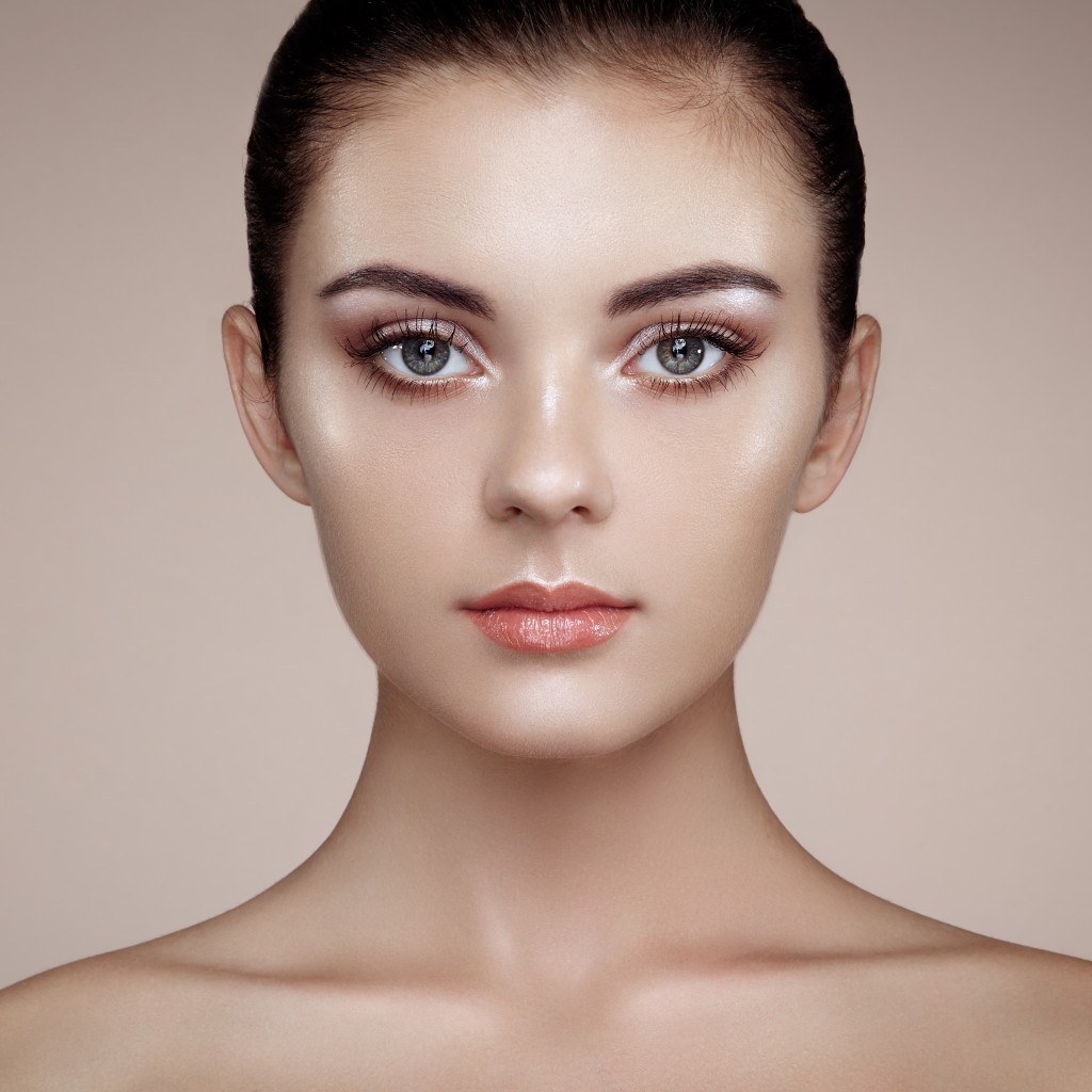 Beautiful woman face. Perfect makeup. Beauty fashion. Eyelashes. Cosmetic Eyeshadow. Highlighting